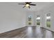 A spacious bedroom featuring newer floors and lots of natural light at 5722 Antler Trl, Lakeland, FL 33811