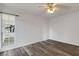Bedroom showcasing wood-look flooring and window at 5722 Antler Trl, Lakeland, FL 33811