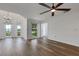 Bright living room area boasting contemporary wood-look flooring and natural light at 5722 Antler Trl, Lakeland, FL 33811