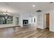Spacious living room featuring updated flooring and views of the back and front yards at 5722 Antler Trl, Lakeland, FL 33811