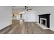 Open kitchen with white cabinetry and modern appliances, connected to the living area at 5722 Antler Trl, Lakeland, FL 33811