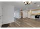 Spacious living room showcasing new flooring and access to the updated kitchen and bath at 5722 Antler Trl, Lakeland, FL 33811