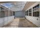 Rear patio with translucent roof, garden boxes and many windows at 5722 Antler Trl, Lakeland, FL 33811