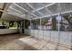 Spacious screened patio offering serene backyard views and ample outdoor seating at 5722 Antler Trl, Lakeland, FL 33811
