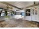 Wide, screened patio with door, brick accents and partial outdoor roof at 5722 Antler Trl, Lakeland, FL 33811
