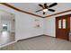 Spacious sunroom with tiled floor and decorative windows at 5722 Antler Trl, Lakeland, FL 33811