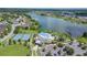 The aerial view of the community includes a pool, clubhouse, and tennis courts at 6524 Great Bear Drive Blvd, Lakeland, FL 33805
