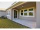 The back patio offers sliding glass door access to the home's interior at 6524 Great Bear Drive Blvd, Lakeland, FL 33805
