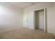 Bedroom features neutral carpet, light walls and standard sized closet at 6524 Great Bear Drive Blvd, Lakeland, FL 33805