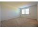 Light-filled bedroom with plush carpeting and natural light at 6524 Great Bear Drive Blvd, Lakeland, FL 33805