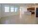 Spacious open-concept living room and kitchen area, perfect for entertaining and relaxation at 6524 Great Bear Drive Blvd, Lakeland, FL 33805