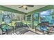 Inviting screened-in porch with comfortable seating and views of the backyard, perfect for relaxing at 6533 Angus Dr, Lakeland, FL 33810