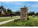 Landscaped monument sign for the Parkside community in a suburban setting at 7116 Cruz Ct, Lakeland, FL 33813