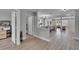 Open-concept living spaces featuring wood-look floors, neutral walls, and seamless flow for easy living at 7116 Cruz Ct, Lakeland, FL 33813