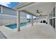Beautiful backyard pool and spacious patio featuring ceiling fans for outdoor enjoyment at 7116 Cruz Ct, Lakeland, FL 33813