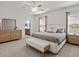 Spacious main bedroom with ensuite bathroom access, plush carpet, and neutral decor at 7515 Sw 107Th Ln, Ocala, FL 34476