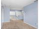 Upstairs loft with carpet and a view to the first floor at 8818 Tottenham Way, Kissimmee, FL 34747
