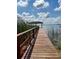 Dock with lakeside gazebo at 910 Van Dr, Auburndale, FL 33823