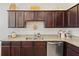 Modern kitchen featuring granite countertops and stainless steel appliances at 943 Grandin St, Davenport, FL 33837