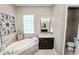 Bathroom featuring a soaking tub, elegant fixtures, and a separate toilet area at 961 Christina Chase Dr, Lakeland, FL 33813