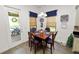 Cozy dining nook with natural light, wood table, and backyard views at 961 Christina Chase Dr, Lakeland, FL 33813