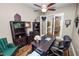 Stylish office featuring dark wood furnishings, a comfortable chair, and bright natural light at 961 Christina Chase Dr, Lakeland, FL 33813