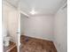 Bathroom features tile flooring, toilet, shower, and neutral paint at 1133 Bryn Mawr Ave, Lake Wales, FL 33853