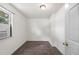 Bedroom featuring fresh carpet, a window AC unit and natural light at 1133 Bryn Mawr Ave, Lake Wales, FL 33853
