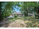 Charming single-story home with mature trees and a spacious front yard at 1133 Bryn Mawr Ave, Lake Wales, FL 33853