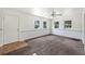 Cozy living room featuring ample natural light and plush carpeting at 1133 Bryn Mawr Ave, Lake Wales, FL 33853