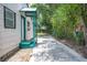 Spacious side yard and walkway with ample room for outdoor activities or potential expansion at 1133 Bryn Mawr Ave, Lake Wales, FL 33853