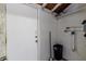 Unfinished basement with white walls and concrete floors at 121 F Sw Ave, Winter Haven, FL 33880