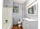 Well-lit bathroom featuring modern sink and shower at 121 F Sw Ave, Winter Haven, FL 33880