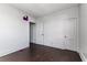 Bedroom with hardwood floors, doorways and purple objects at 121 F Sw Ave, Winter Haven, FL 33880