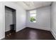 A simply decorated bedroom has a window and closet at 121 F Sw Ave, Winter Haven, FL 33880