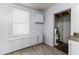 Utility room with laminate flooring and built in cabinets at 121 F Sw Ave, Winter Haven, FL 33880