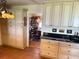Bright kitchen boasts ample cabinet storage and a stylish countertop at 1216 W Lake Buckeye Dr, Winter Haven, FL 33881