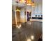 Elegant kitchen features a dark countertop and unique, colorful lighting at 1216 W Lake Buckeye Dr, Winter Haven, FL 33881