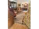Elegant living room featuring hardwood floors, refined furniture, and a stylish area rug at 1216 W Lake Buckeye Dr, Winter Haven, FL 33881