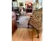 Cozy living room showcases a stylish rug and a mix of classic furniture pieces at 1216 W Lake Buckeye Dr, Winter Haven, FL 33881