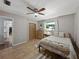 Charming bedroom with natural light, closet, ceiling fan, and tile floors at 1232 Fairlee St, Lakeland, FL 33813