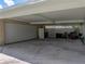 Large covered carport with parking for vehicles and storage for tools and outdoor equipment at 1232 Fairlee St, Lakeland, FL 33813