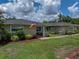 Inviting home exterior with a neatly landscaped yard and a welcoming entryway at 1232 Fairlee St, Lakeland, FL 33813
