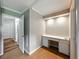 Hallway view with built-in desk and storage; leads to various rooms in the home at 1232 Fairlee St, Lakeland, FL 33813