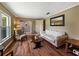 Living room with hardwood floors, neutral walls, and view to other rooms at 1232 Fairlee St, Lakeland, FL 33813