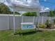 Cozy backyard swing set provides a relaxing spot to unwind surrounded by greenery at 1232 Fairlee St, Lakeland, FL 33813