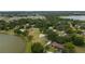 Aerial view of a lakefront property showcasing its prime waterfront location at 21 Lake Ave, Winter Haven, FL 33880