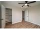 The bedroom includes an open closet space and an open door at 21 Lake Ave, Winter Haven, FL 33880