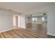 Spacious living room with LVP floors and sliding glass doors overlooking a view of the water at 21 Lake Ave, Winter Haven, FL 33880