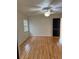Bedroom featuring wood flooring and a ceiling fan for added comfort and style at 2235 Grand Cypress Dr # 561, Lakeland, FL 33810